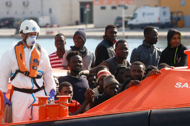 M?LAGA, SPAIN - OCTOBER 29: Some men are seen on a boat after their rescue by Salvamento Maritimo at the Port of Malaga when they were sailing a drift in a small boat on October 29, 2019 in M?laga, Spain. (Photo by ?lex Zea/Europa Press via Getty Images)